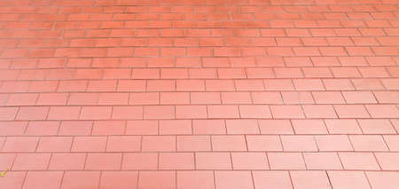 red brick wall pattern background, panoramic wall of red tile patternの写真素材
