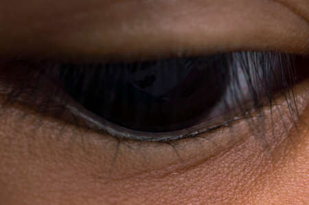 selective focus of girl's face at eyes area, crop image around girl's eyesの写真素材