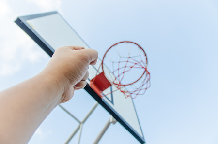 hands under hoop,basketball sportの写真素材