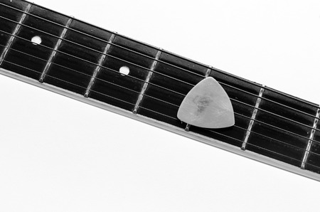 Acoustic Guitar bar and pick , black and whiteの写真素材