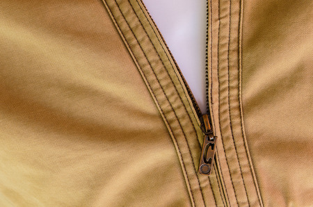Zipper / Textile / Open Zipper Of  Jacket with white backgroundの写真素材