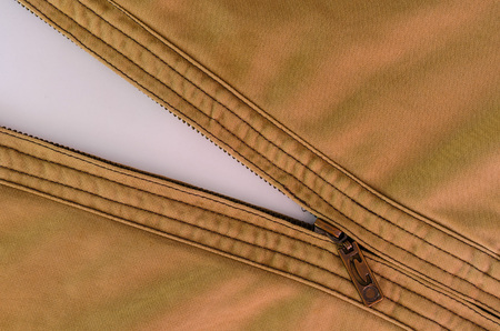 Zipper / Textile / Open Zipper Of  Jacket with white backgroundの写真素材