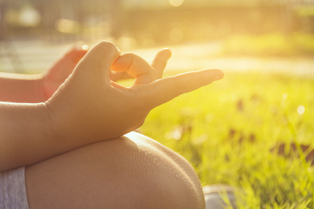 Closeup hands asian women While Doing Yoga Exerciseの写真素材