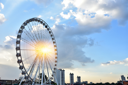 Ferris wheel on cloudy sky backgroundの写真素材