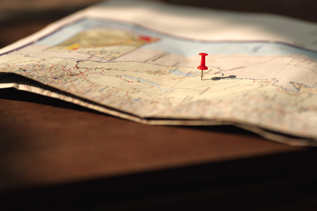 Putting pins to destination on map. Plan travel and relax with vacation holiday.
