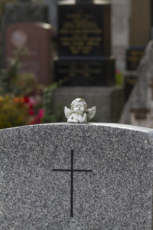 Angel on a grave stoneの写真素材