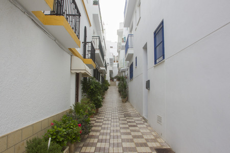 Facades of spanish houses in the white city of Conil de la Frontera on the Costa del luzの写真素材