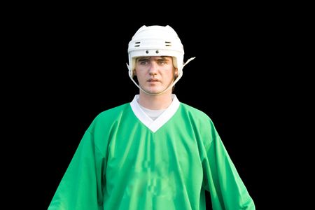 a young hockeyball player on the black backgroundの写真素材
