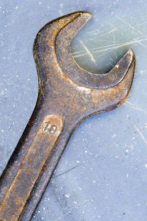 a very old and rusty abandoned spanner - close upの写真素材