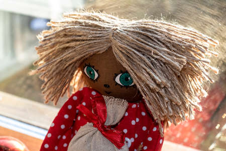 Handmade textile toy handsome boy amulet at home DOMOVOYの写真素材