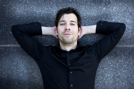 portrait of a man resting and smilingの写真素材