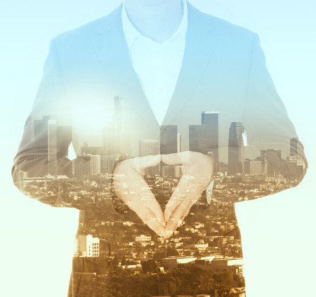 double exposure of businessman and skyline of Los Angelesの写真素材