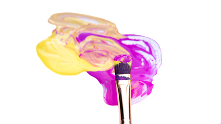 closeup of brush and paint with white backgroundの写真素材