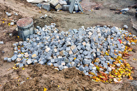 Close-up of a road construction site with cobblestonesの写真素材