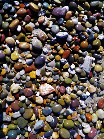 Close up of colorful pebbles on the beachの写真素材