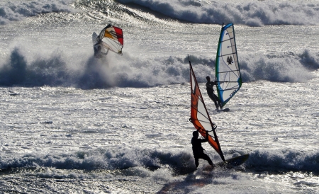 Windsurfers having fun on the Atlantic Oceanの写真素材