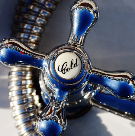 Close up old fashioned chrome bathroom fixturesの写真素材