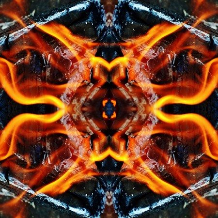 Close up of wood fire with orange flamesの写真素材