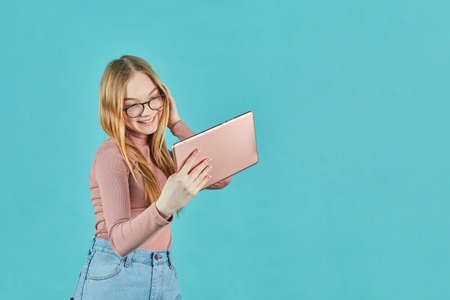 Smart looking girl with glasses. Social media and online communication. Attractive young student...