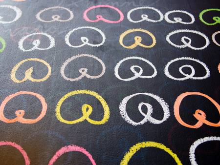 Colorfull pretzel drawing on a chalk boardの写真素材