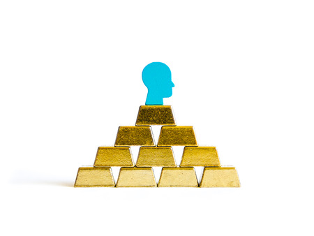 Golden bricks: wealth conceptualisation isolated with tokensの写真素材