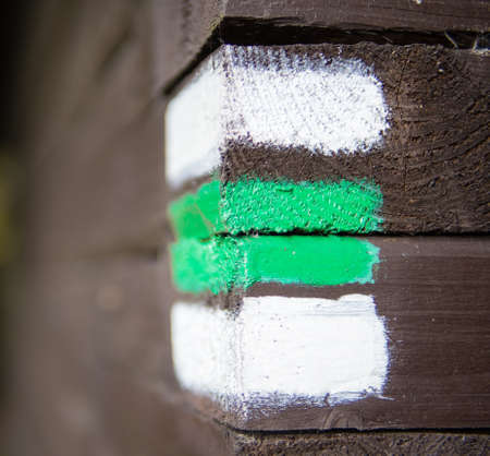 Green sign on wooden wall, czech tourismの写真素材