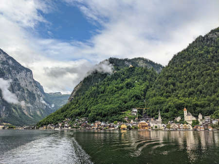 Hallstatt Austria city at lake and mountains panorama