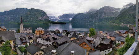 Hallstatt Austria city at lake and mountains panorama