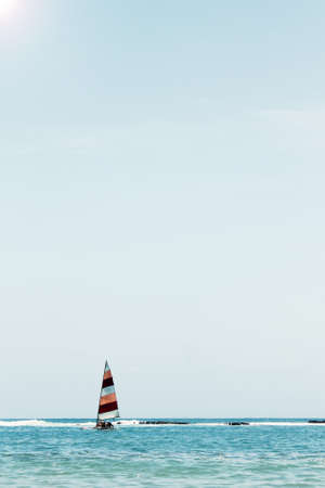 Sailboat in the sea in the evening Maceio, Brazil.
