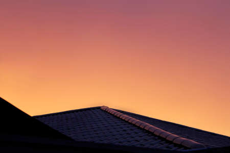 Sunset house roofの写真素材