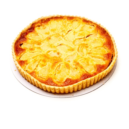 Pear and frangipane tart isolated on a white stuido background.の写真素材