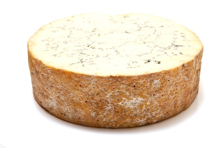 Stilton cheese isolated on a white studio background.の写真素材