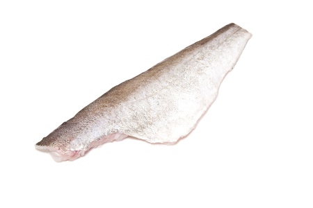 Pollock (Pollachius pollachius) fish fillet isolated on a white studio background.