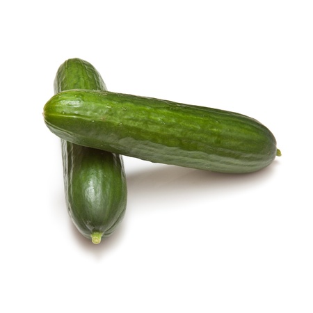 Mini Cucumbers isolated on a white studio background.の写真素材