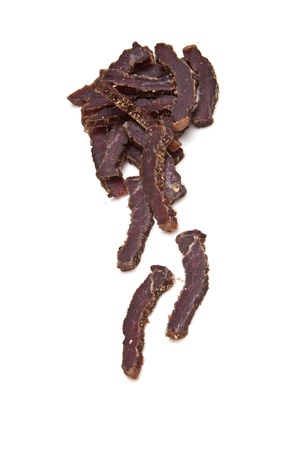 South African biltong (beef) isolated on a white backgroundの写真素材