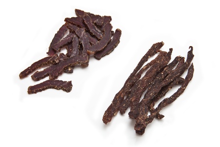 South African biltong strips  isolated on a white backgroundの写真素材