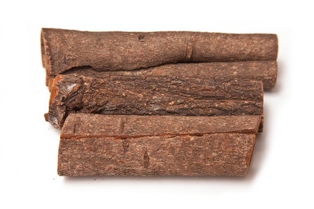 Cinamon bark sticks isolated on a white studio background の写真素材