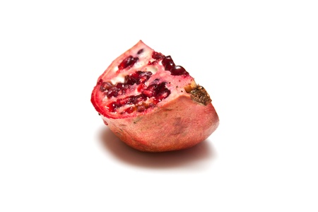 Pomegranate isolated on a white studio background.の写真素材