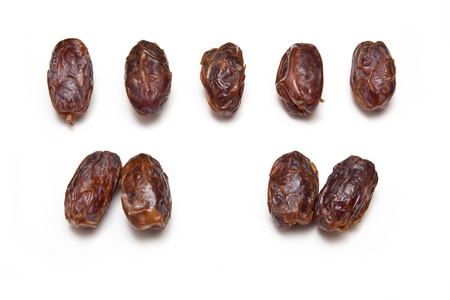 Dried Medjool dates isolated on a white studio background.の写真素材