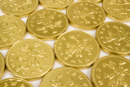 Chocolate money isolated on white studio background.