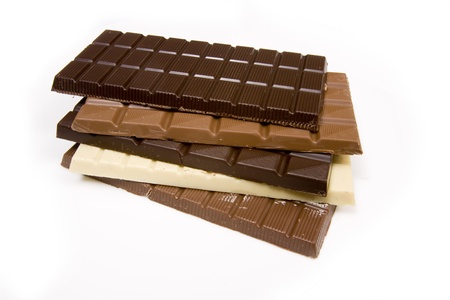 Slabs of chocolate isolated on a white studio background.の写真素材
