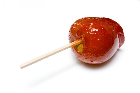 Toffee apple isolated on a white studio backgroundの写真素材