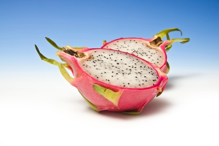 Dragon fruit on a graduated blue studio background.の写真素材