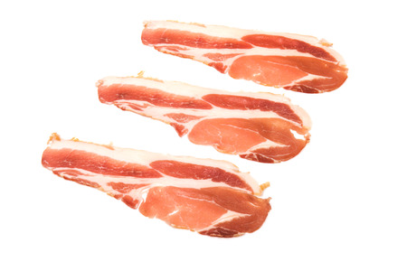 Applewood smoked bacon isolated on a white studio background.の写真素材