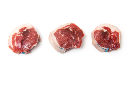 Goat meat noisettes isolated on a white studio .の写真素材