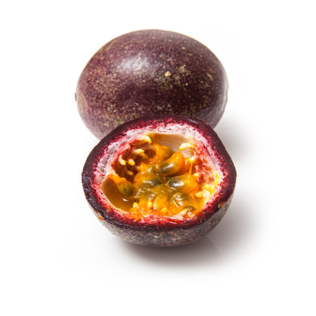 Passion fruit isolated on a white studio background.の写真素材