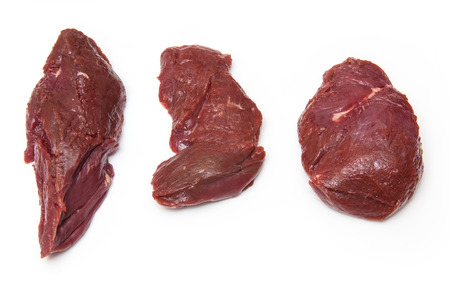Uncooked Kangaroo meat steaks isolated on a white studio background.の写真素材