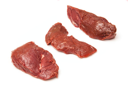 Uncooked Kangaroo meat steaks isolated on a white studio background.の写真素材