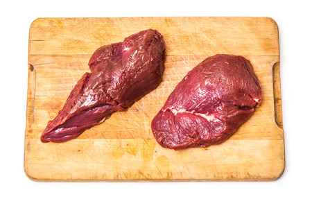 Uncooked Kangaroo meat steaks isolated on a white studio background.の写真素材