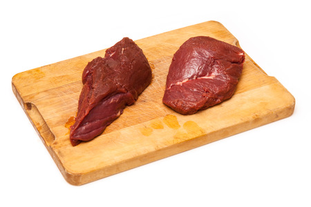 Uncooked Kangaroo meat steaks isolated on a white studio background.の写真素材